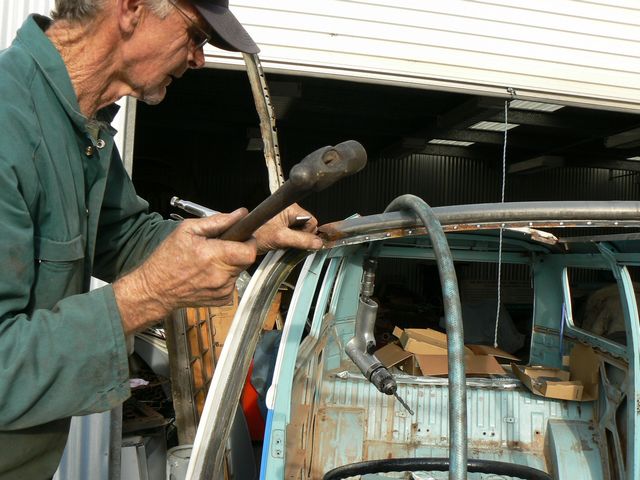 Welding new roof onto Kombi